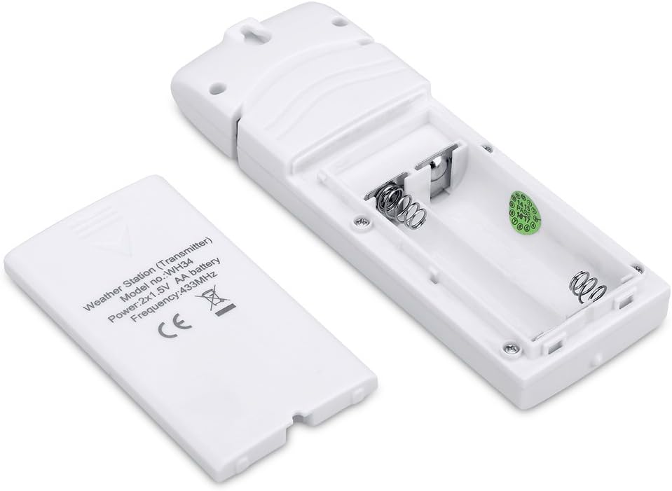 The remote sensor for the EXCELVAN WH1175 weather station with its battery cover removed, showing the battery compartment.