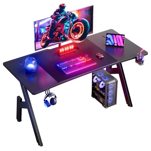 HLFURNIEU Mesa Gaming 120 x 60 cm, Escritorio Gaming Ergonómica, Mesa Gamer de Fibra de Carbono, Mesa para Ordenador con Portavasos y Gancho para Auriculares, Negro