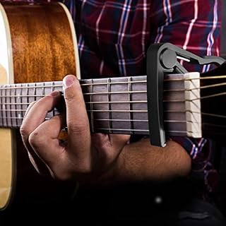Capodastre noir avec accordeur de guitare à clipser pour ukulélé électrique acoustique et plus encore. - Les Beatles, Paul McCartney, John Lennon, RIngo Starr, George Harrison Capodastre noir avec accordeur de guitare à clipser pour ukulélé électrique acoustique et plus encore. – Image 3