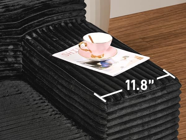 Close-up of the sofa's wide armrest with dimensions