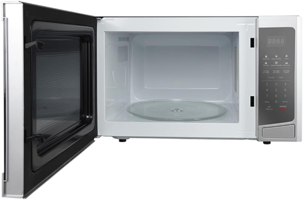 Interior view of the Winia KOS-1N3MSS microwave oven with door open and glass turntable