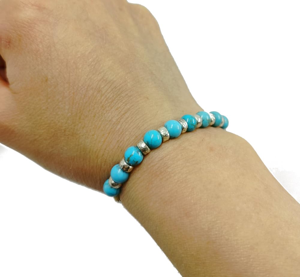 Spadarella bracciale con anellini in argento da 3 mm e pietra naturale turchese tonda da 4 mm.Prodotto artigianale.Made in Italy.Unisex.Lunghezza 19cm.