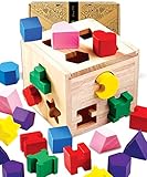 El juguete de aprendizaje temprano Shape Sorting Cube Jaques es una maravillosa adición a la colección de juguetes de madera de cualquier niño - adecuado a partir de 10 meses.