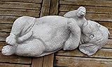 Betonfigur Hund Rottweiler Welpe auf dem Rücken liegend vordere Pfoten nach oben Gartenfigur Dekofigur.