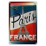 Plongez dans le romantisme de Paris avec cette charmante plaque en étain vintage. L'emblématique Tour Eiffel se dresse majestueusement sur un fond aux couleurs du drapeau français. Un avion nostalgique tire sa trajectoire, tandis que l'inscription « Paris » en lettres incurvées éveille le désir de la ville de l'amour. Parfait pour les amateurs de design rétro et les amateurs de France.