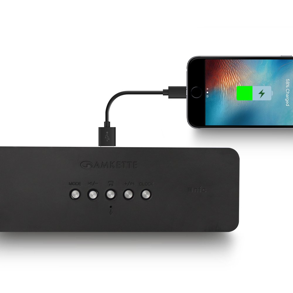 Amkette Trubeats S50 speaker charging a smartphone via its USB port