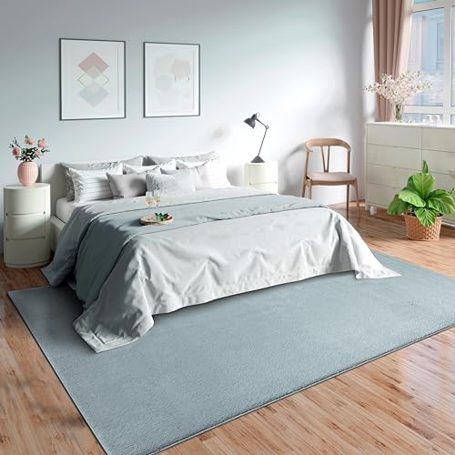 Tapis de salon lavable Olivia en bleu de dimensions 60x110 cm