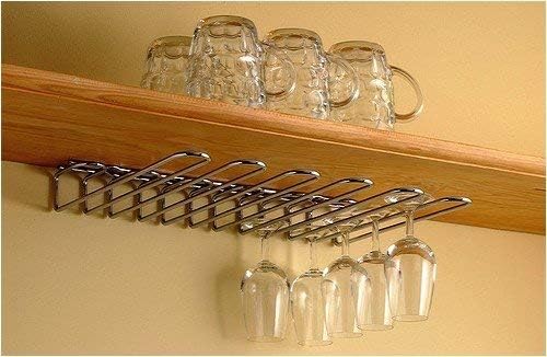 Paderno World Cuisine Chromed Steel Wall Mounted Glass Rack installed under a wooden shelf with stemware