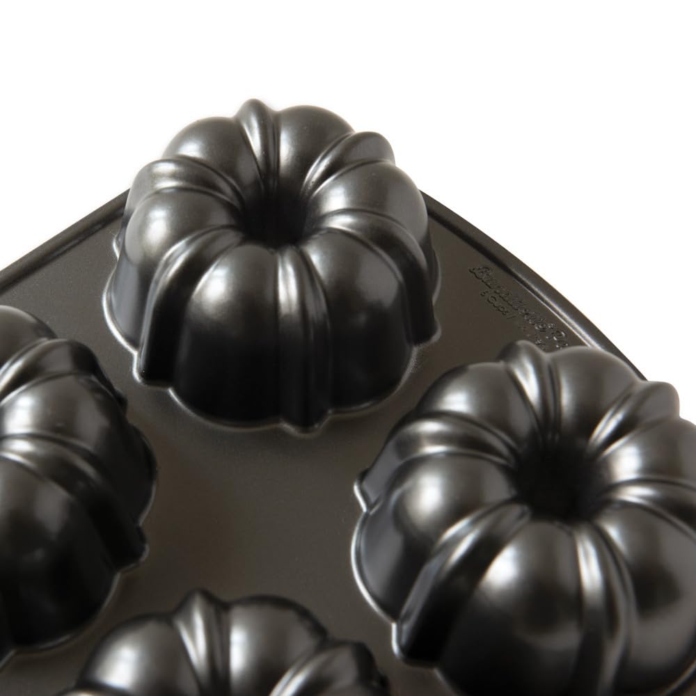 Nordic Ware Molde original Bundtlette de aluminio fundido, mini bundt lata, molde para tartas para 6 pasteles, color grafito