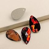 Les strass à dos plat sont fabriqués en résine, avec de jolies formes et de belles facettes coupantes, parfaits comme décorations délicates pour le nail art.