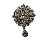 Questa spilla di perle dal design creativo può essere l'accessorio perfetto for qualsiasi vestito.