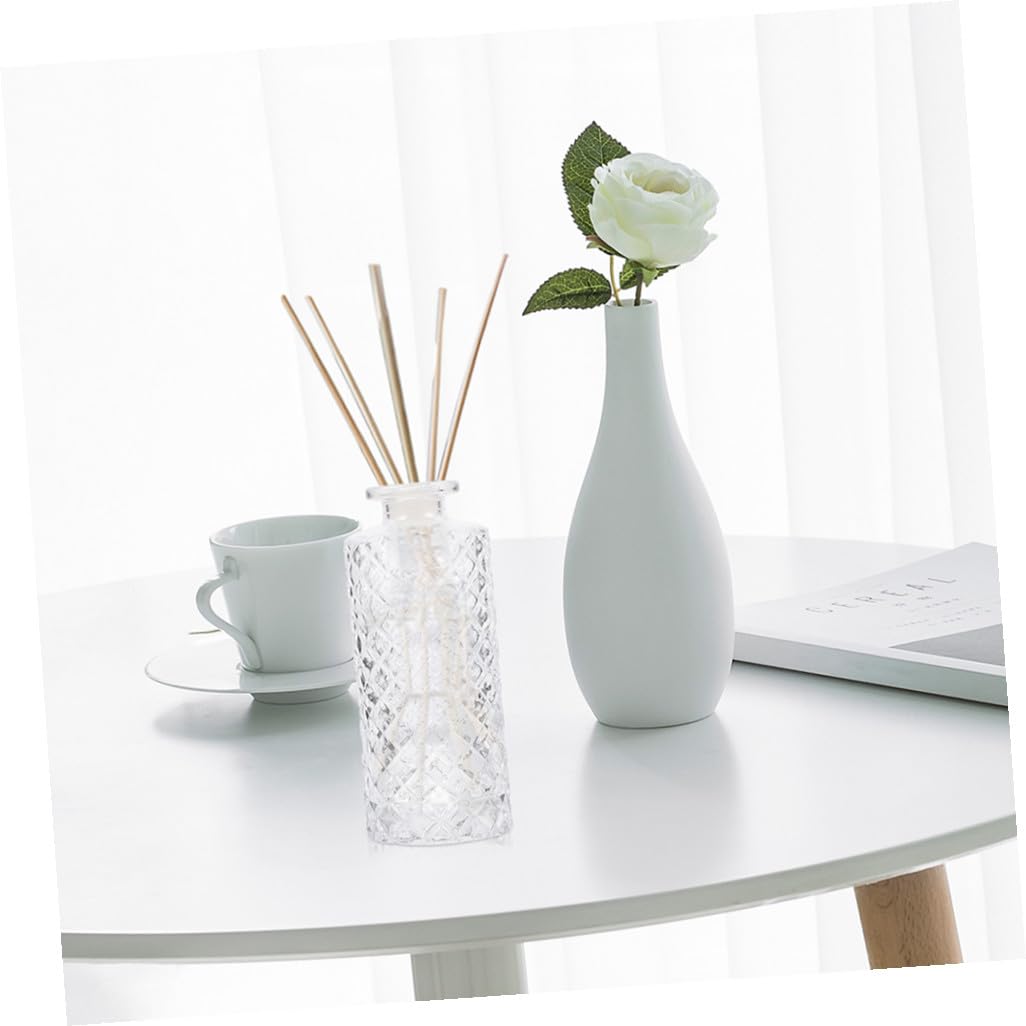 4 Pezzi Bottiglie Diffusore Aromaterapia in Vetro Trasparente Riutilizzabili e Ricaricabili Design Elegante per Casa Ufficio e Eventi per Profumare e Decorare Ambienti