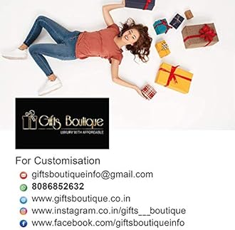 Stunning Onam Gift Hamper by Angroos Gifts Boutique Includes payasam mix, souvenir,Jaggery Banana Chips bottle, Boat, Banana Chips bottle, Kerala saree, Kerala mund ,greeting card, gift box