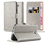 fundas j7 pro PROTECCIÓN: La funda ofrece una muy buena protección integral. Tanto la pantalla como la parte trasera están bien protegidos en esta funda. La carcasa silicona ofrece una protección adicional para las esquinas y los bordes del teléfono móvil. Gracias a la cerradura magnética, el teléfono inteligente queda también protegido, por ejemplo, dentro de un bolso de mano.