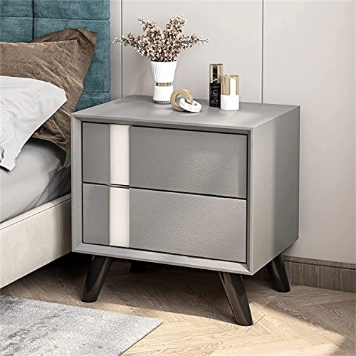 Table de chevet moderne en cuir gris pour une chambre cosy et ordonnée