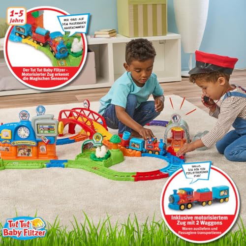 VTech TUT TUT Baby Flitzer – Bunter Bahnhof | Interaktives Spielset mit motorisiertem Zug, 2 Waggons, 70+ Melodien & Geräuschen, 19+ Schienen & 6 Spielbereichen, ab 1 Jahr