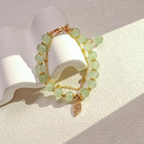 Pulsera de hojas doradas con doble cadena para lucir en eventos 4