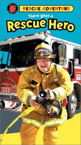 Real Wheels: There Goes a Rescue Hero [VHS]