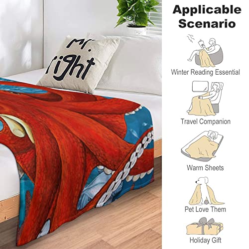 Couverture polaire pieuvre rouge pour vos soirées cocooning sur le canapé