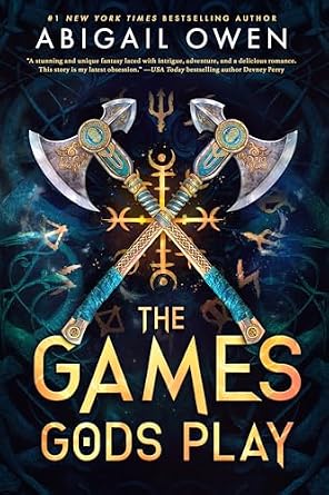 the Games Gods Play by Abigail Owen, a fantasy romance book cover depicting Greek god symbols with two large crossed axes on a midnight blue background.