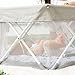 My Play Baby Portable Infant Bassinet, Indoor Outdoor UPF 50+ Canopy, Mesh Sides, 29x14 Inches, Foldable Travel Playard with Toys, Padded Base, Newborn to 15 Pounds