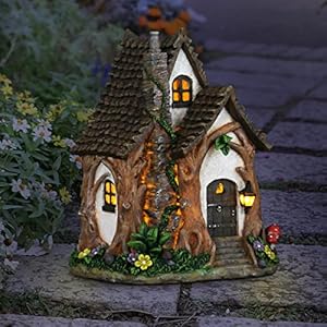 Exhart Fairy Garden Sculpture, Solar Tree Trunk Fairy House Garden Statue, 3 LED Lights, Durable Resin, Outdoor Lawn and Yard Decoration, 8.5 x 9.5 x 11.5 Inch Exhart Fairy Garden Sculpture Solar Tree Trunk Fairy House Garden Statue 3 LED Lights Durable Resin Outdoor Lawn and Yard Decoration 85 x 95 x 115 Inch