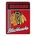 NORTHWEST Officially Licensed Chicago Blackhawks NHL Team Throw Blanket 46″×60″ – Licensed Microfiber Throw with Hockey Logos for Fans, Dorms, Game Day Couches & Fan Caves