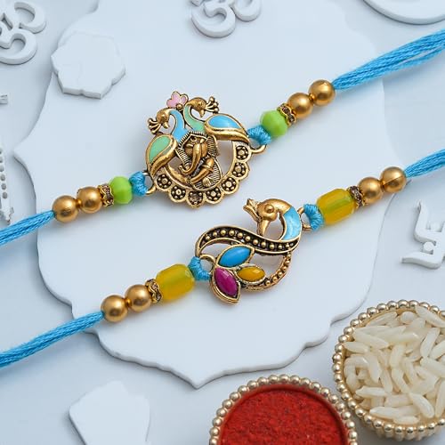 Image of eCraftIndia Peacock Lord Ganesha Rakhi Set of 2 | Rakhi for Brother Bhaiya Bhai with Best Bro Ever Fridge Magnet | Roli Chawal Pack