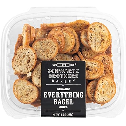 Everything Bagel Chips NY Style Bagel Crisps. Organic, Vegan, Kosher. From the artisans of Schwartz Brothers Bakery. Baked Fresh. Twice Baked. 8 ounce container. Great Snack. Delicious. Pack of 4. Cover