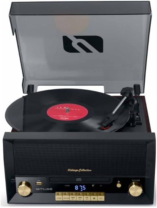 Davant view of the Muse MT-112 W Micro System with the turntable lid closed, showing the control panel and speaker grille.