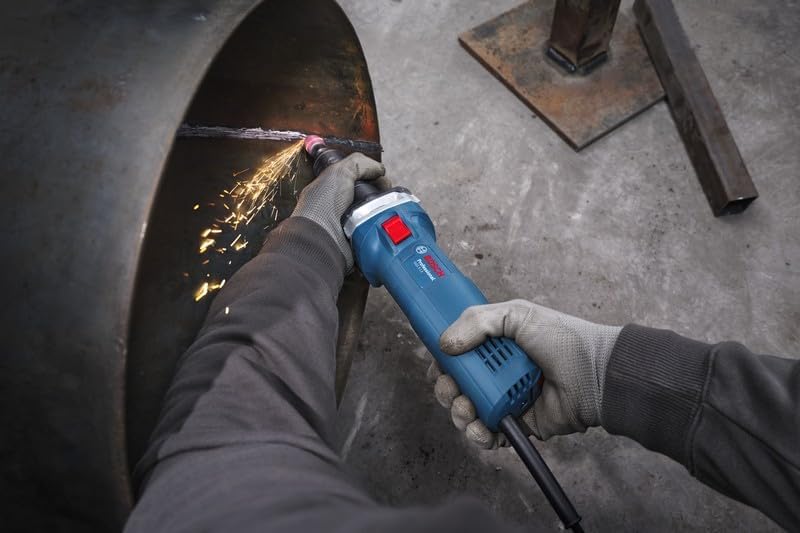 Worker using Bosch GGS 5 LS straight grinder on a metal surface, viewed from above