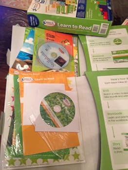 Paperback Amazon Exclusive Hooked on Phonics Learn to Read 1st Grade Complete with BONUS S Book