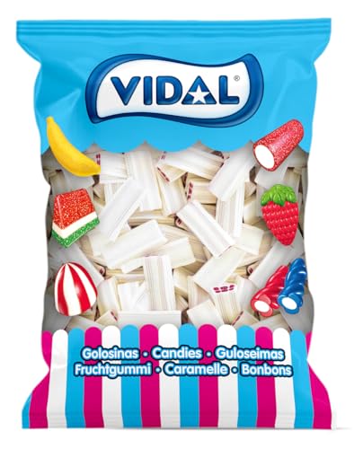 Vidal Golosinas. Ladrillos Blancos Fresa Nata. Regaliz relleno con sabor fresa y nata, con cobertura ácida. Color blanco por fuera y rojo por dentro. Sin gluten ni grasa. Bolsa 250 u