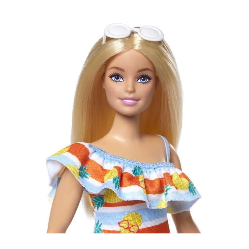 Amazon.com: Barbie Loves the Ocean Doll with Blonde Hair Wearing