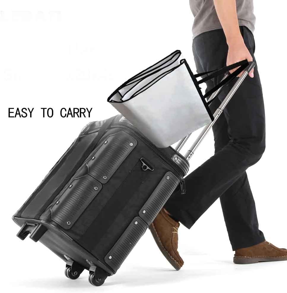 Person carrying folded SLSP Wedding Dress Garment Bag with luggage
