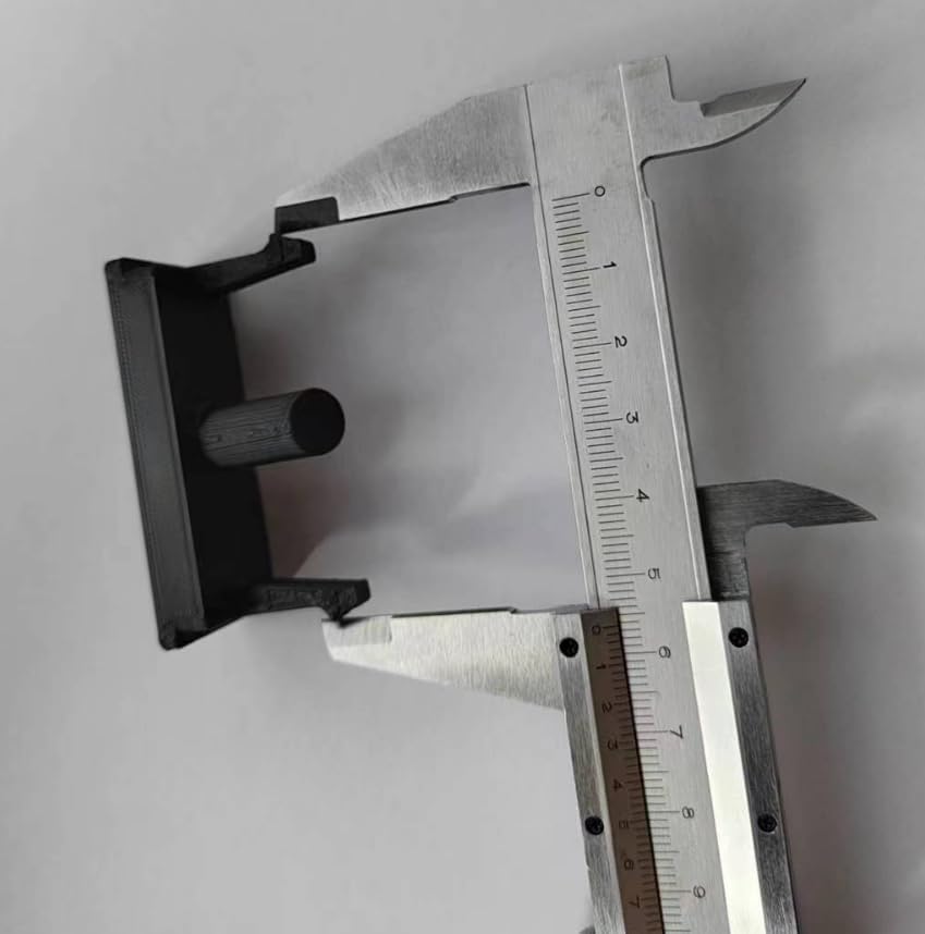 Microwave push button replacement measured with a caliper, showing side dimensions.