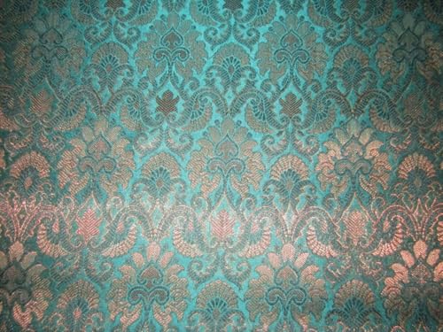 Tissu brocart vert au mètre avec reflets bronze métallique pour confection de veste