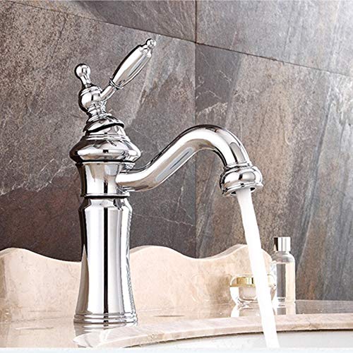 Grifo de fregadero negro y plata para transformar la rutina de limpieza en tu baño actual