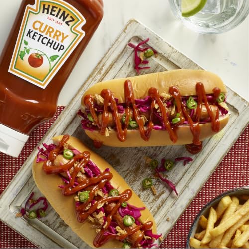 Image of Heinz Curry Ketchup • International Taste Tangy Spiced Gourmet Ketchup for Fries, Sausages, Burgers & Snacks • Thick Curry Flavoured Tomato Condiment • Restaurant Style Dip & Cooking Sauce, 20.11 oz ℮ 570 g
