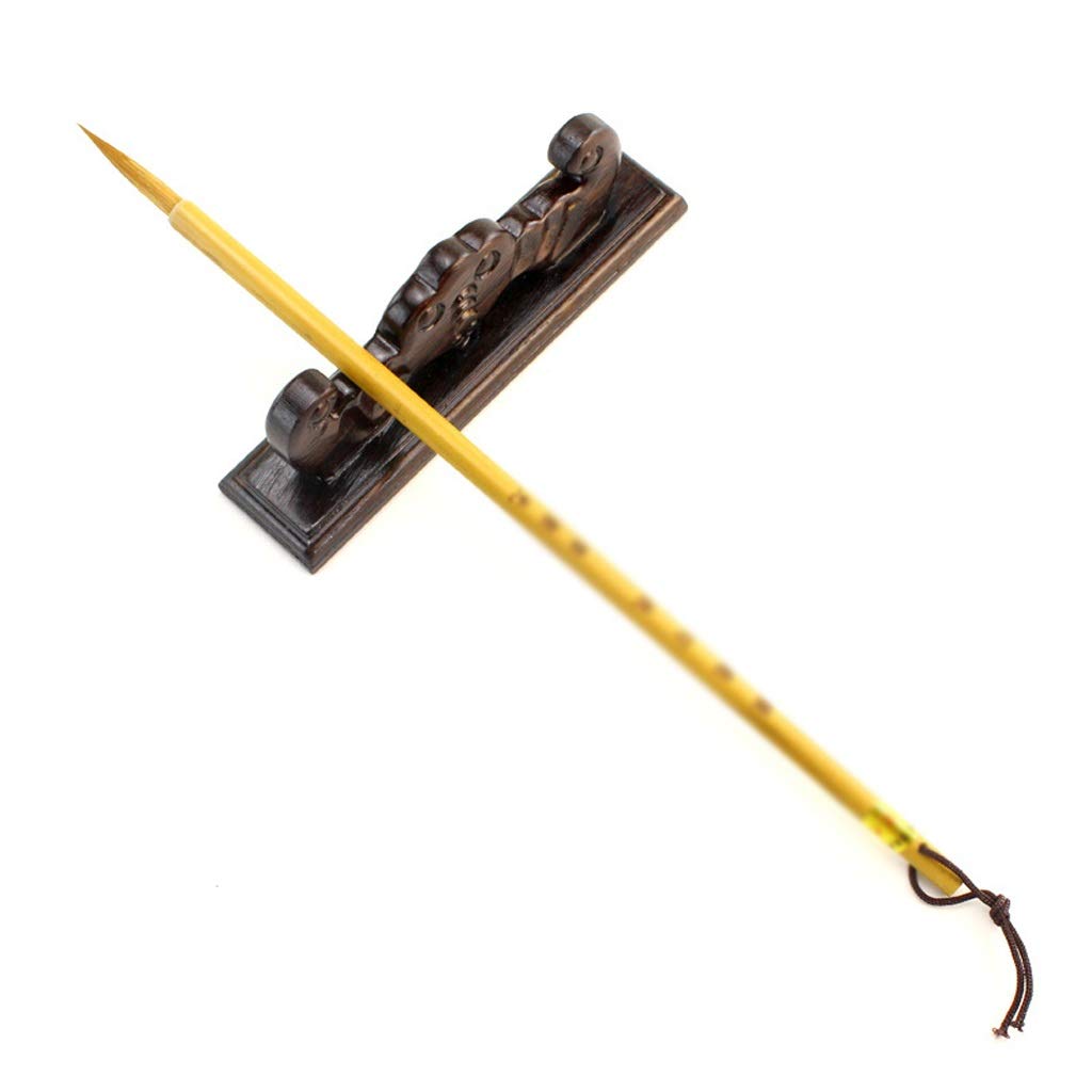 Écriture manuscrite calligraphie étudiants via ce brosse pinceau manche