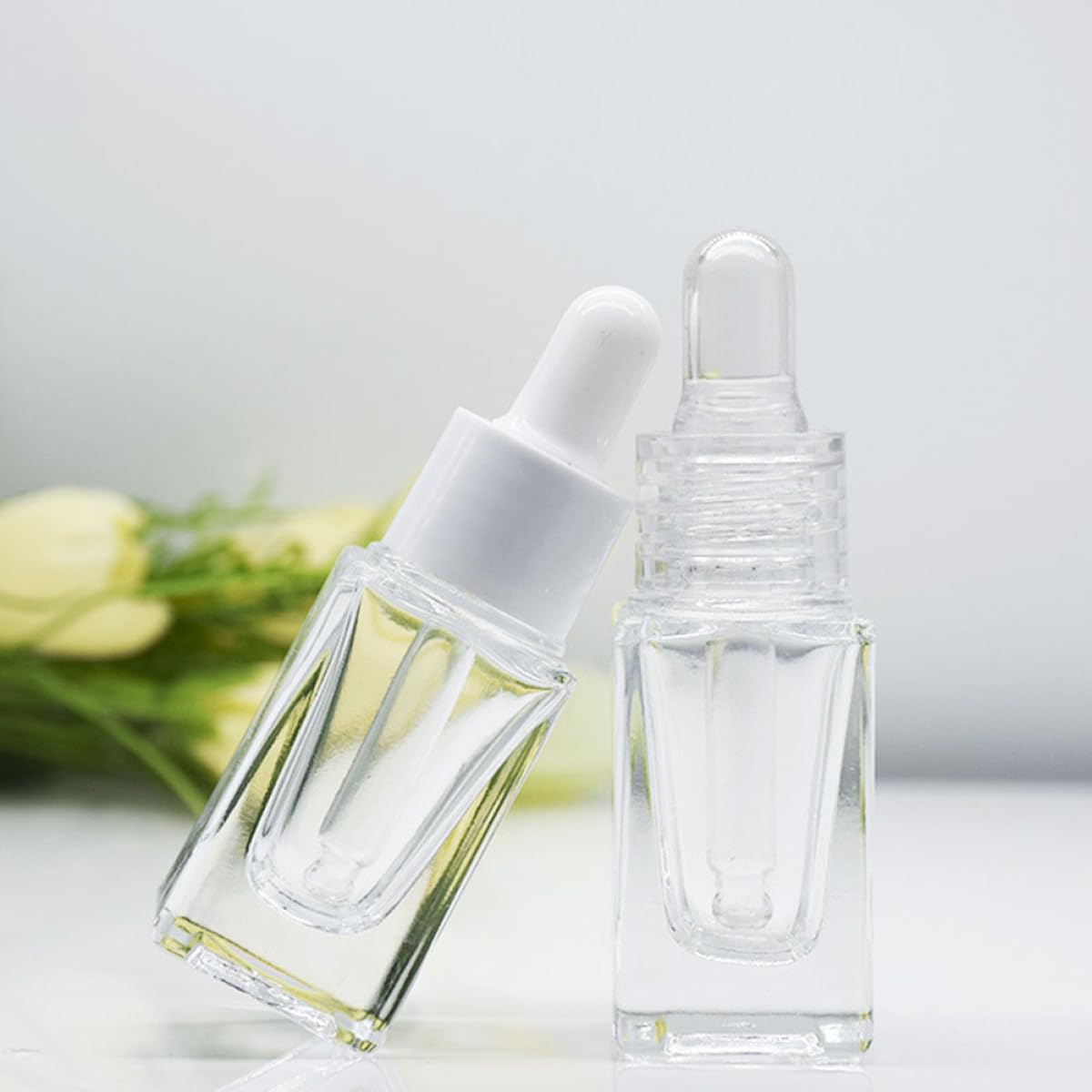 Flaconi Contagocce per Oli Essenziali 15ml in Vetro Trasparente Quadrato, Set da 10 Pezzi Contagocce in Vetro e Anello Plastico Bianco, Ricaricabili e Portatili per