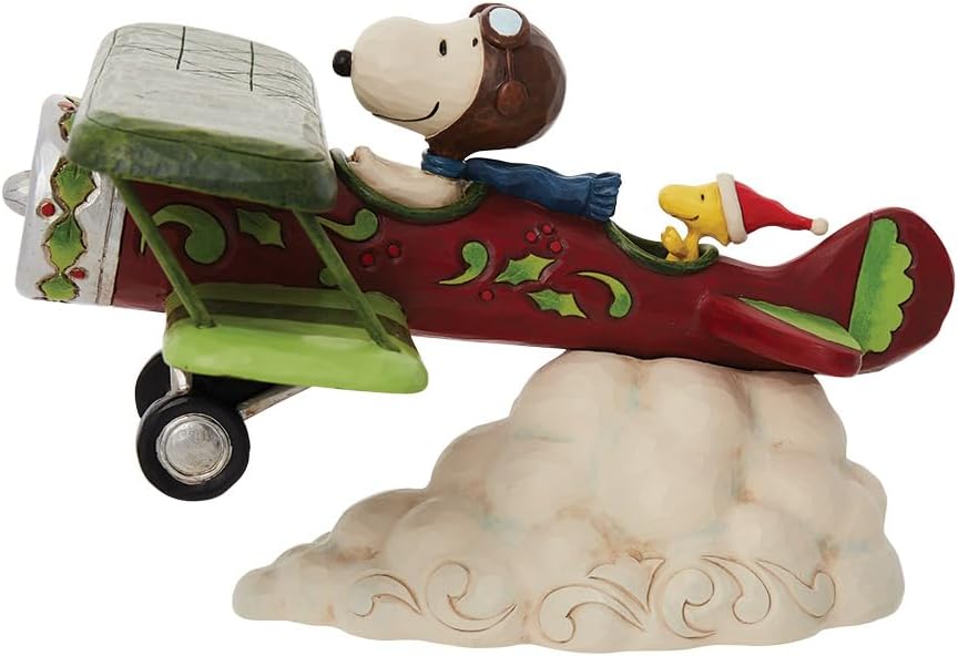 Enesco Peanuts by Jim Shore Snoopy Flying Christmas Ace Plane Figurine, 5.12 Inch, Multicolor