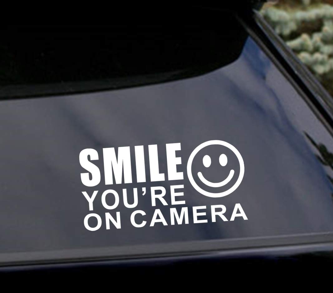 Photo 1 of (2 Pack) 7"x3.5" White - Smile You're On Camera - UV Resistant, Waterproof, Peel & Stick Decor Decal Sticker Quote Adhesive Vinyl Mural Art Script Lettering - For storefronts, cars, trucks, boats, etc