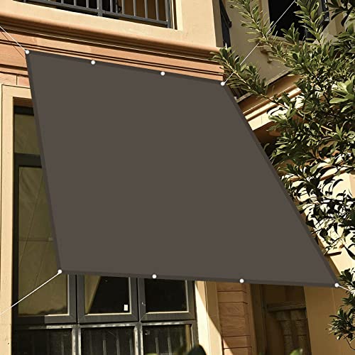 Voile pare-soleil rectangulaire gris foncé contre la chaleur sur la pergola