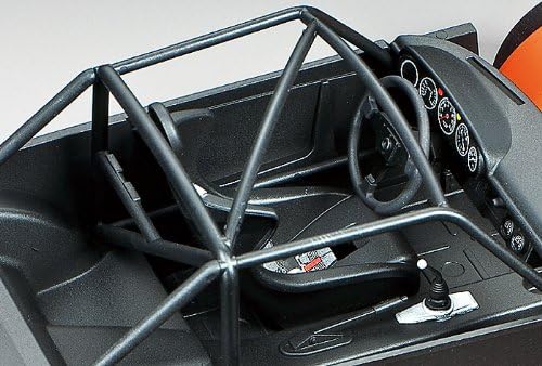 Detailed interior of the Tamiya Porsche 934 model, showing the roll cage and dashboard