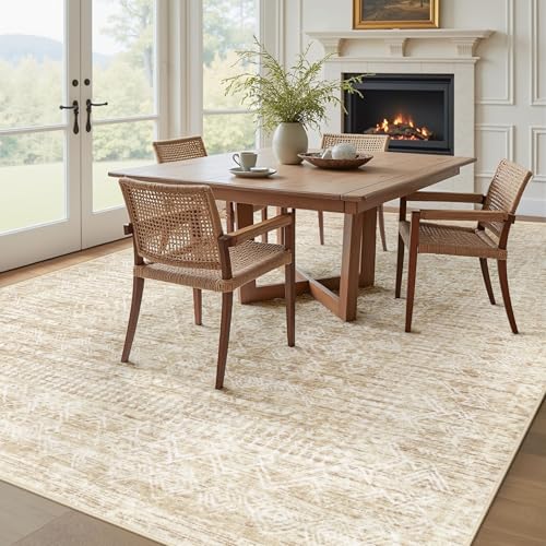 Bright dining room with a wooden table, woven chairs, fireplace, and large ivory patterned area rug