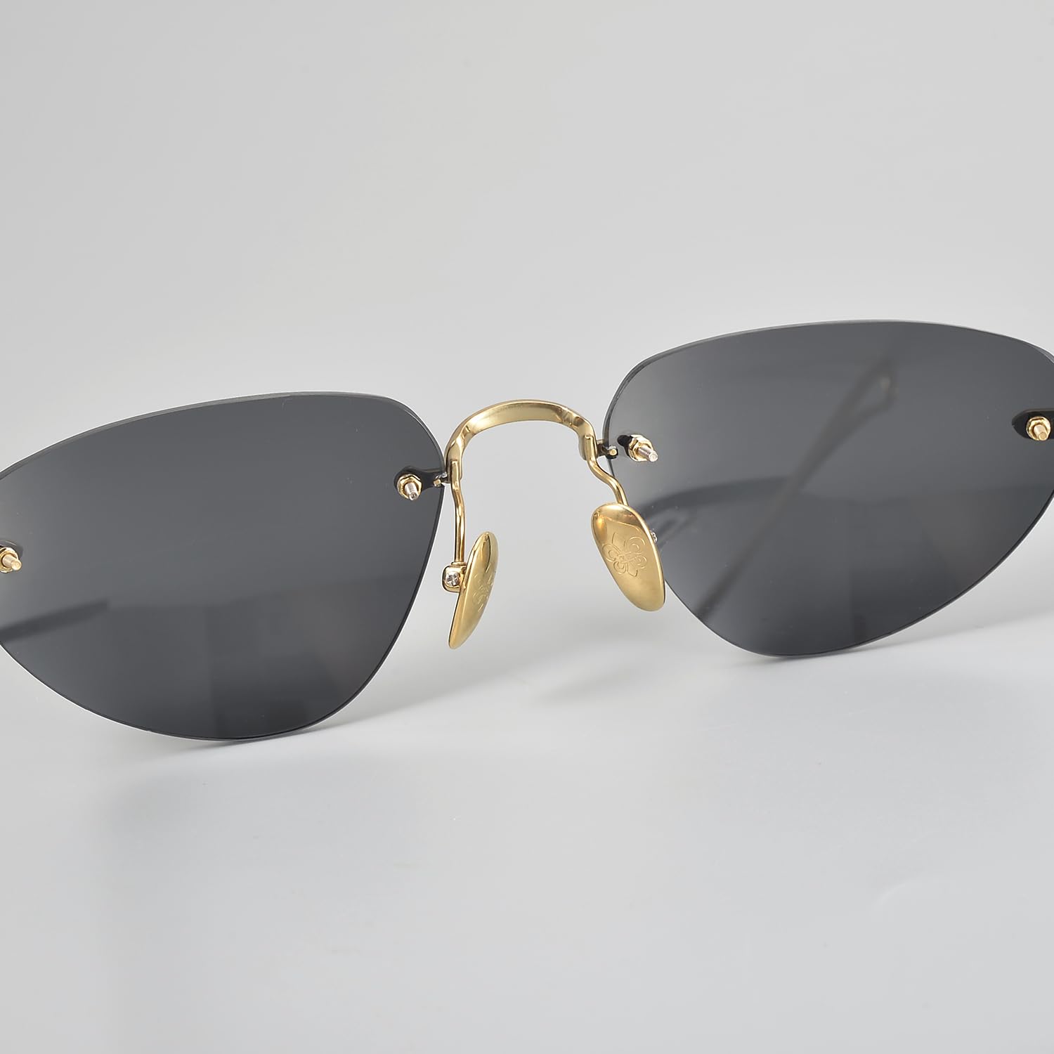 Modne okulary przeciwsłoneczne damskie bezramkowe UV400