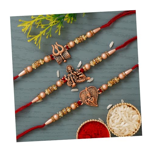 Image of eCraftIndia Red & Golden Set of 3 Trishul with Damru, Lord Ganesha, & Lord Krishna Playing Flute Religious Rakhis with Roli Chawal Pack