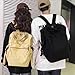 mochila Negras mochila de lona unisex de moda para estudiantes universitarios Imagen de mochila Negras mochila de lona unisex de moda para estudiantes universitarios