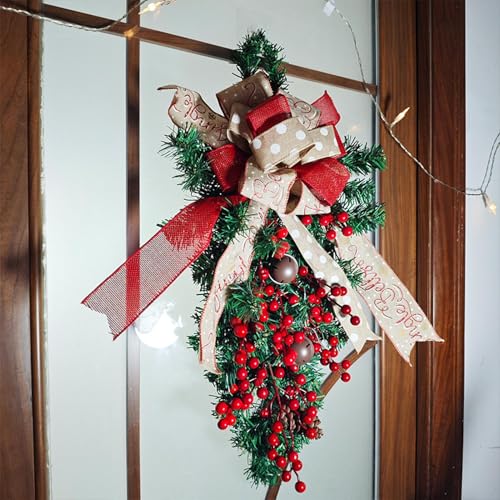 Couronnes de Noël grand nœud de baies rouges et feuillage dense